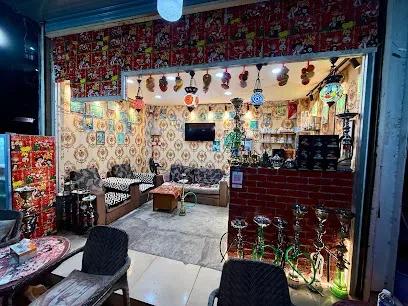 The Neighbour Girls Cafeكافية بنت الجيران